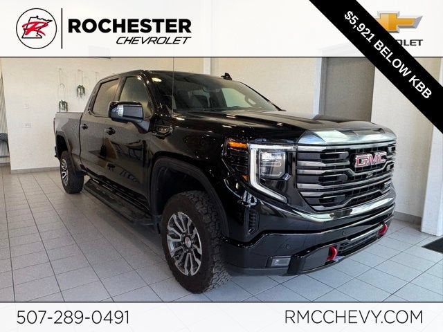 2023 GMC Sierra 1500 AT4 in Onyx Black — front three-quarter view