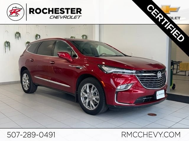 2023 Buick Enclave Essence in Cherry Red Tintcoat — front three-quarter view