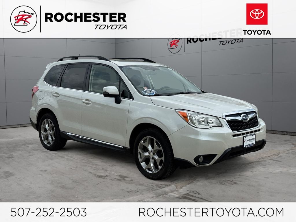 2015 Subaru Forester 2.5i Touring AWD in Satin White Pearl — front three-quarter view