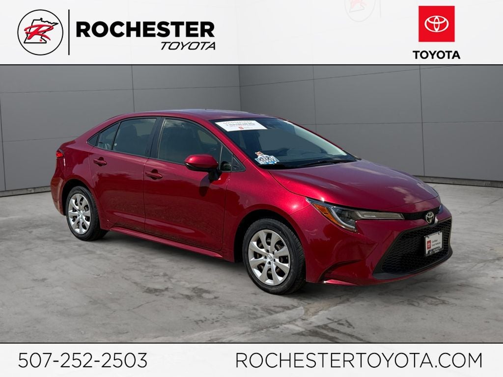 2022 Toyota Corolla LE FWD in Ruby Flare Pearl — front three-quarter view