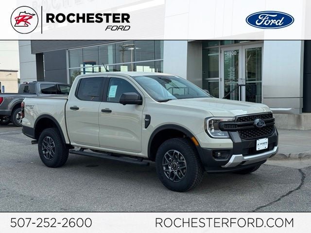2026 Ford Ranger XLT w/Advanced Tow/Tech Pkg in Desert Sand — front three-quarter view