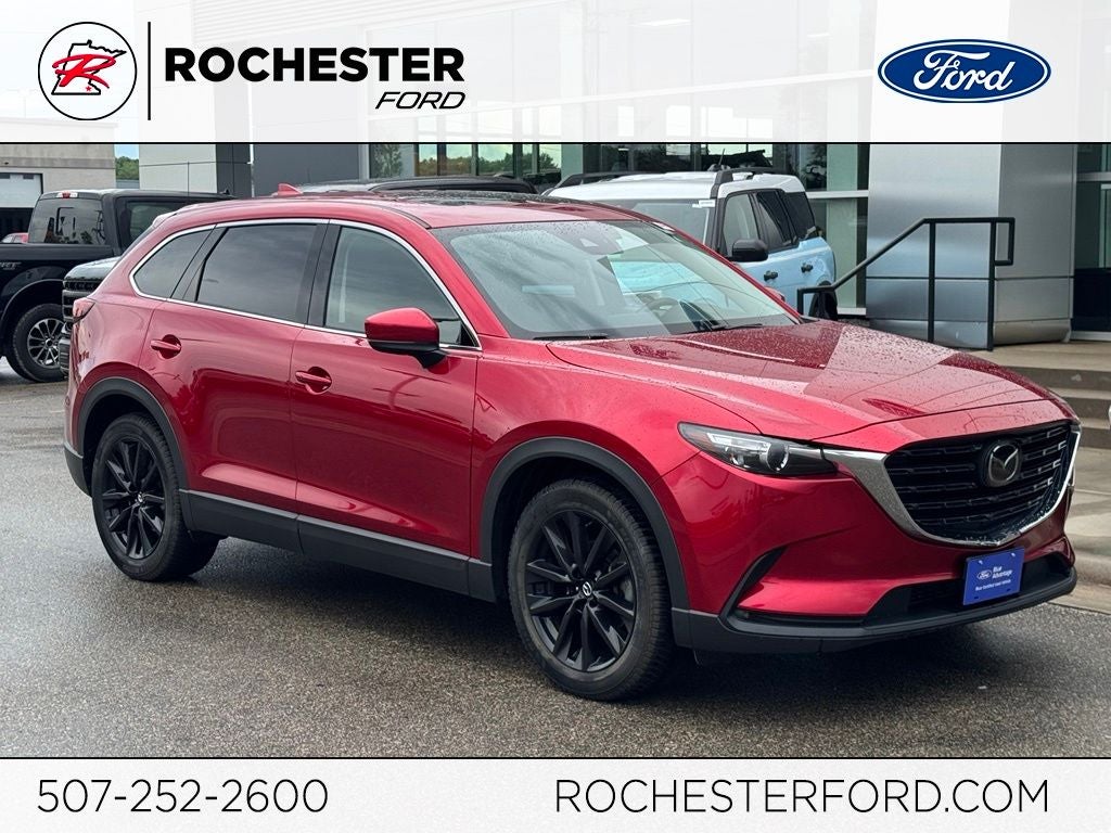 2023 Mazda Mazda CX-9 Touring Plus in Red Crystal — front three-quarter view