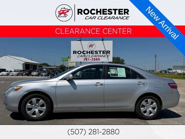 2009 Toyota Camry LE in Silver — front three-quarter view