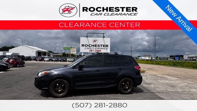 2014 Subaru Forester 2.5i in Dark Gray Metallic — front three-quarter view